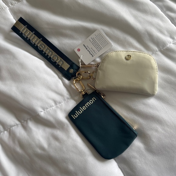78🆕💚 Lululemon Dual Pouch Wristlet Wordmark - Warp Teal Bone Gold - Picture 1 of 7